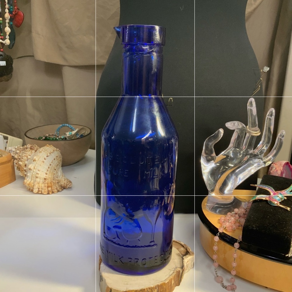 Vintage Blue Glass Milk Bottle